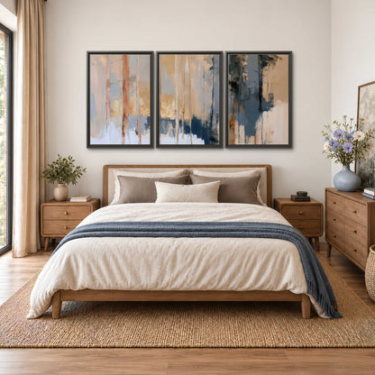 Vertical strokes of cream, blue and ochre suggesting a quiet woodland 3 piece framed canvas wall art styled in an interior