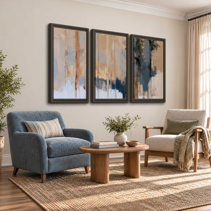 Vertical strokes of cream, blue and ochre suggesting a quiet woodland 3 piece framed canvas wall art styled in an interior