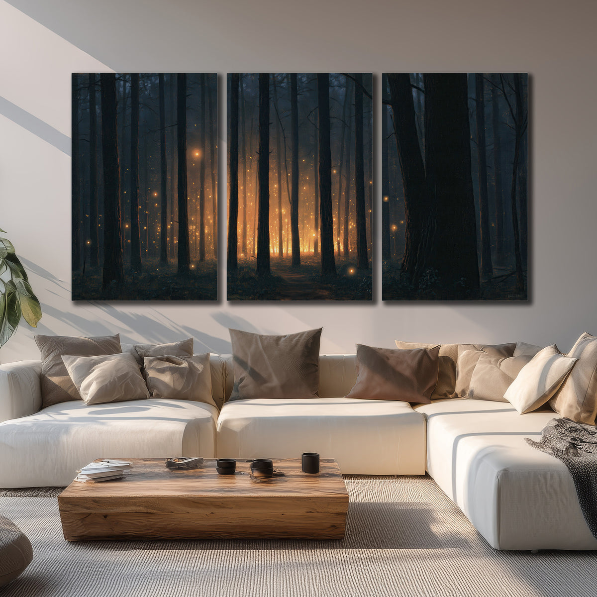 A warm amber glow shining between closely spaced dark forest trunks 3 piece canvas wall art displayed in a living room