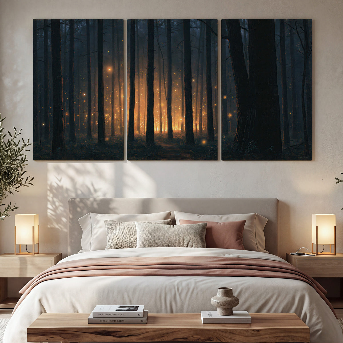 A warm amber glow shining between closely spaced dark forest trunks 3 piece canvas wall art displayed in a bedroom