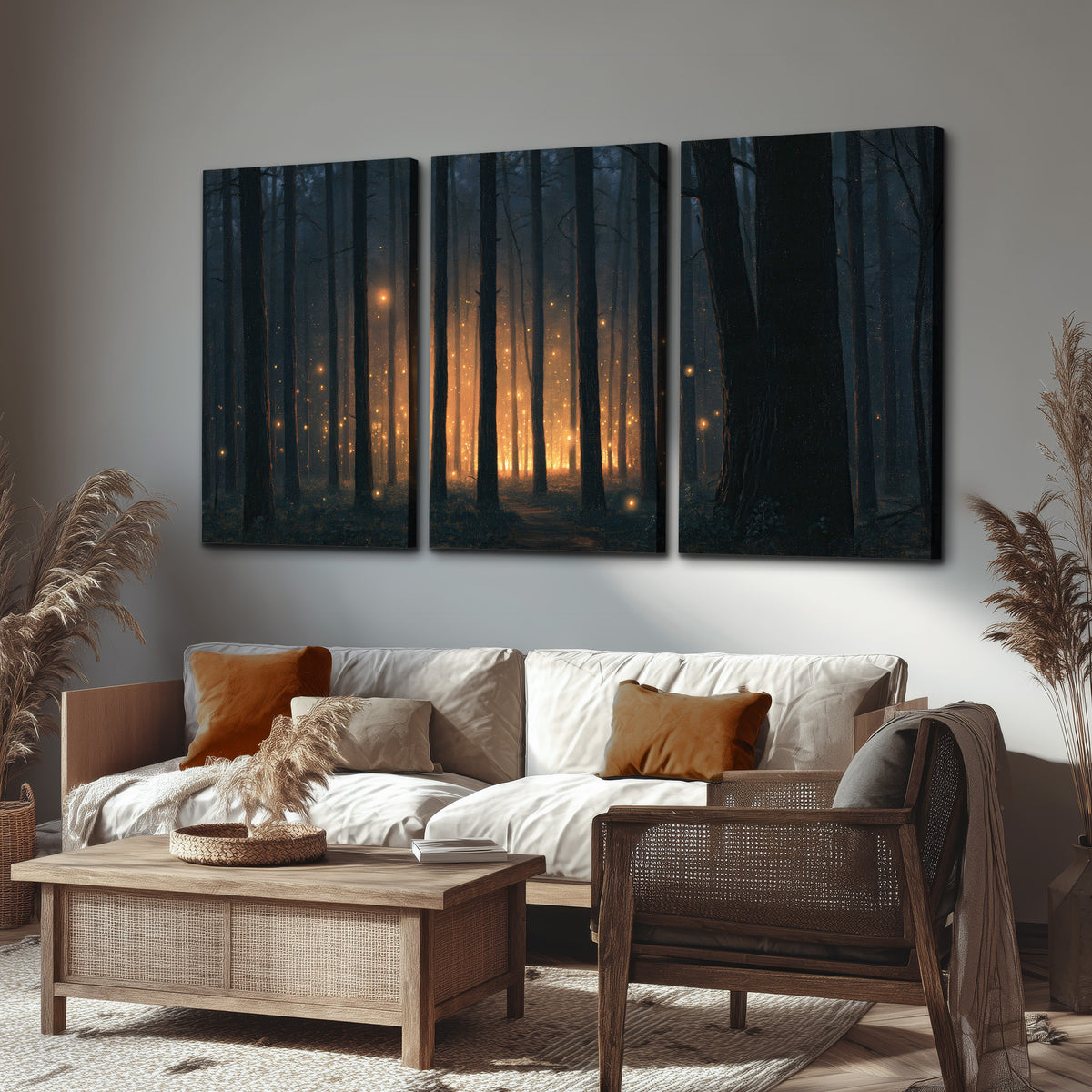 A warm amber glow shining between closely spaced dark forest trunks 3 piece canvas wall art displayed in a rustic living room
