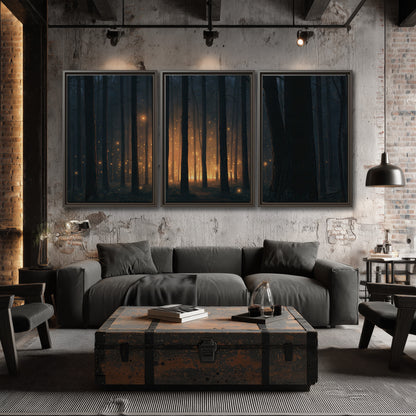 A warm amber glow shining between closely spaced dark forest trunks 3 piece framed canvas wall art displayed in a industrial room