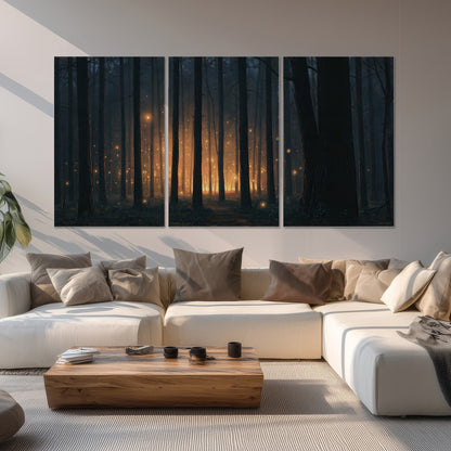 A warm amber glow shining between closely spaced dark forest trunks set of 3 poster prints displayed in a living room