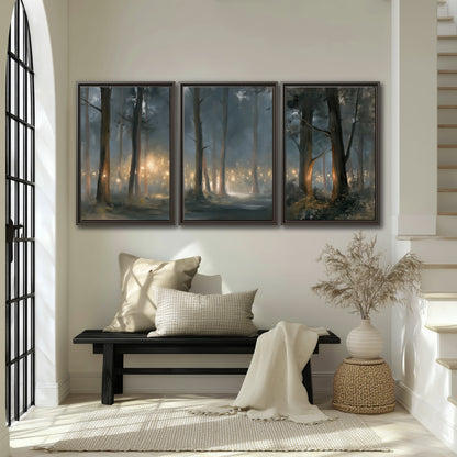 Soft warm light filtering through tall trees in a cool mist-covered forest 3 piece framed canvas wall art displayed in a entryway