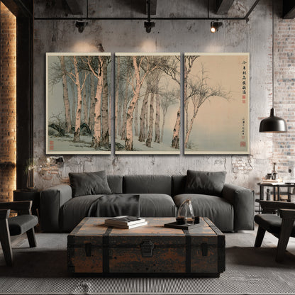 Slender pale birches in a muted woodland scene with decorative script 3 piece canvas wall art displayed in a industrial room