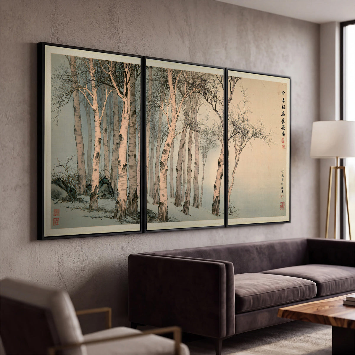Slender pale birches in a muted woodland scene with decorative script 3 piece framed canvas wall art displayed in a modern living room