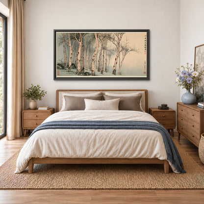 Slender pale birches in a muted woodland scene with decorative script single framed canvas wall art styled in an interior