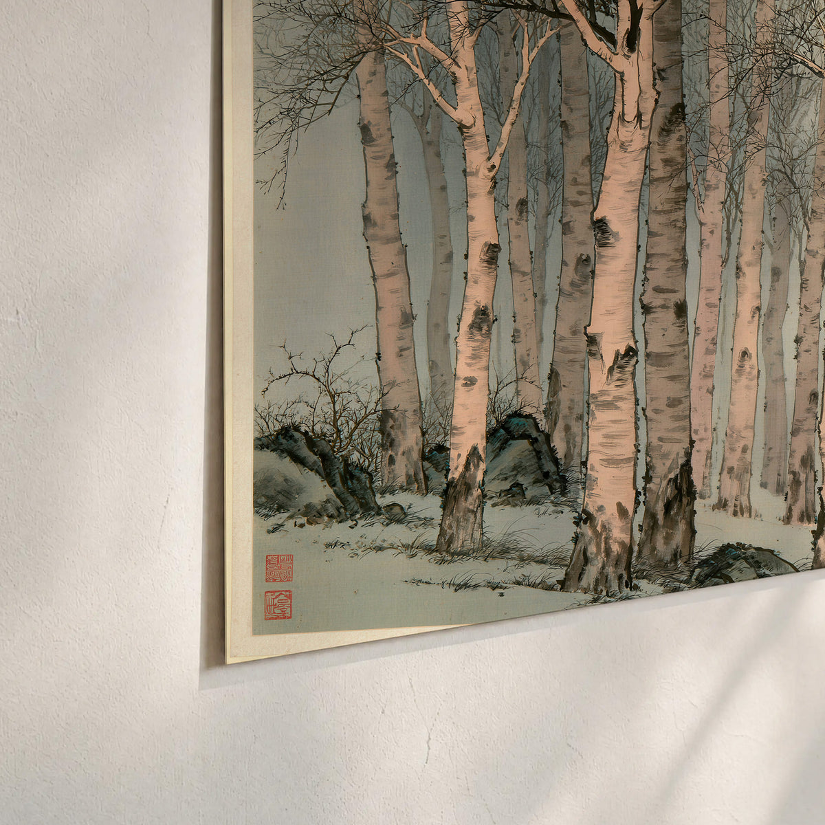 Slender pale birches in a muted woodland scene with decorative script set of 3 poster prints material and edge close up