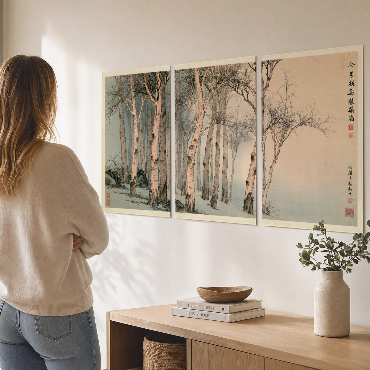 Slender pale birches in a muted woodland scene with decorative script set of 3 poster prints three panel arrangement on a wall