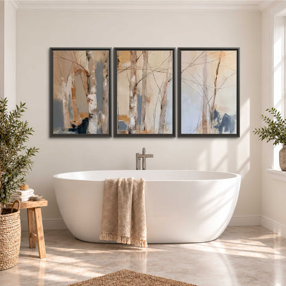 Loose pale blue, peach and cream strokes suggesting a stand of birch trees 3 piece framed canvas wall art styled in an interior