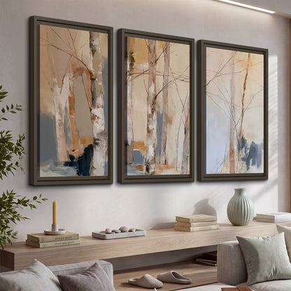 Loose pale blue, peach and cream strokes suggesting a stand of birch trees 3 piece framed canvas wall art displayed in a console