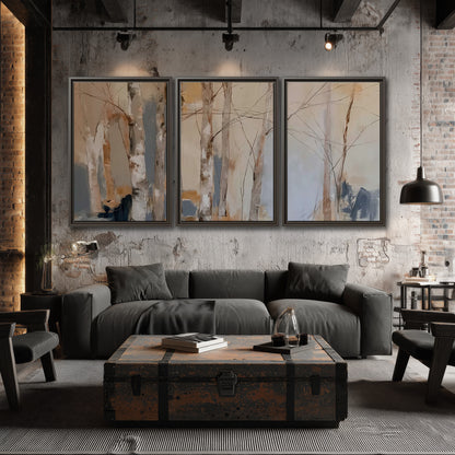 Loose pale blue, peach and cream strokes suggesting a stand of birch trees 3 piece framed canvas wall art displayed in a industrial room