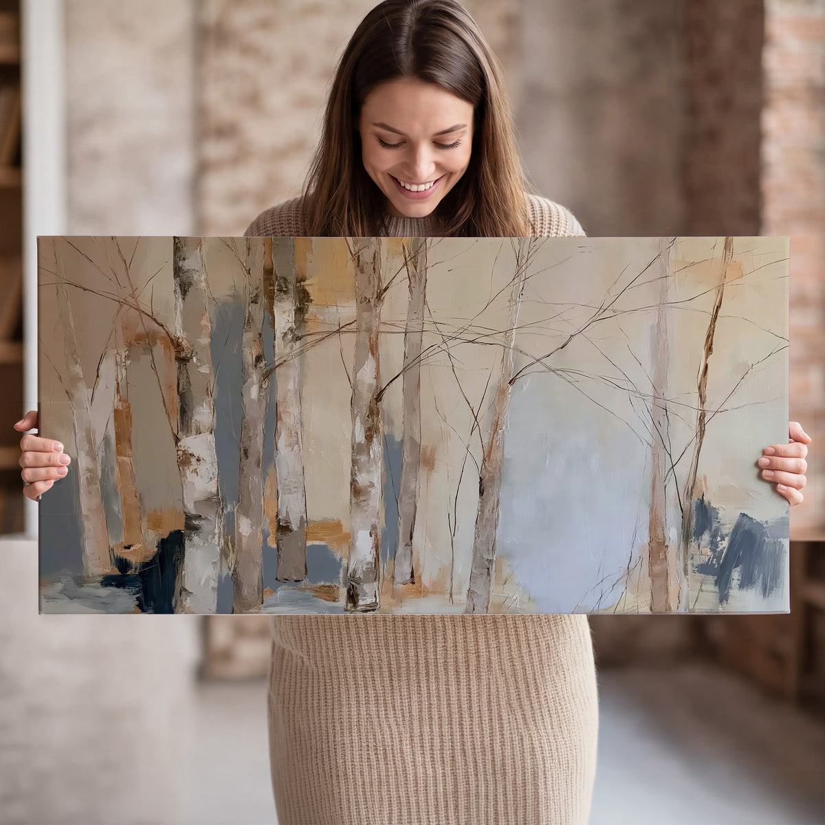 Loose pale blue, peach and cream strokes suggesting a stand of birch trees single canvas wall art held in hands