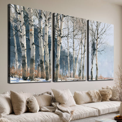 A line of bare birch trees against a cool blue-gray sky 3 piece canvas wall art room and product view