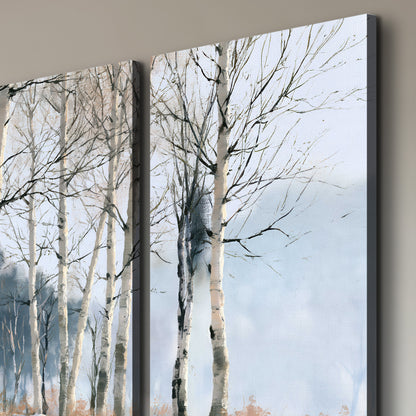 A line of bare birch trees against a cool blue-gray sky 3 piece canvas wall art room and product view