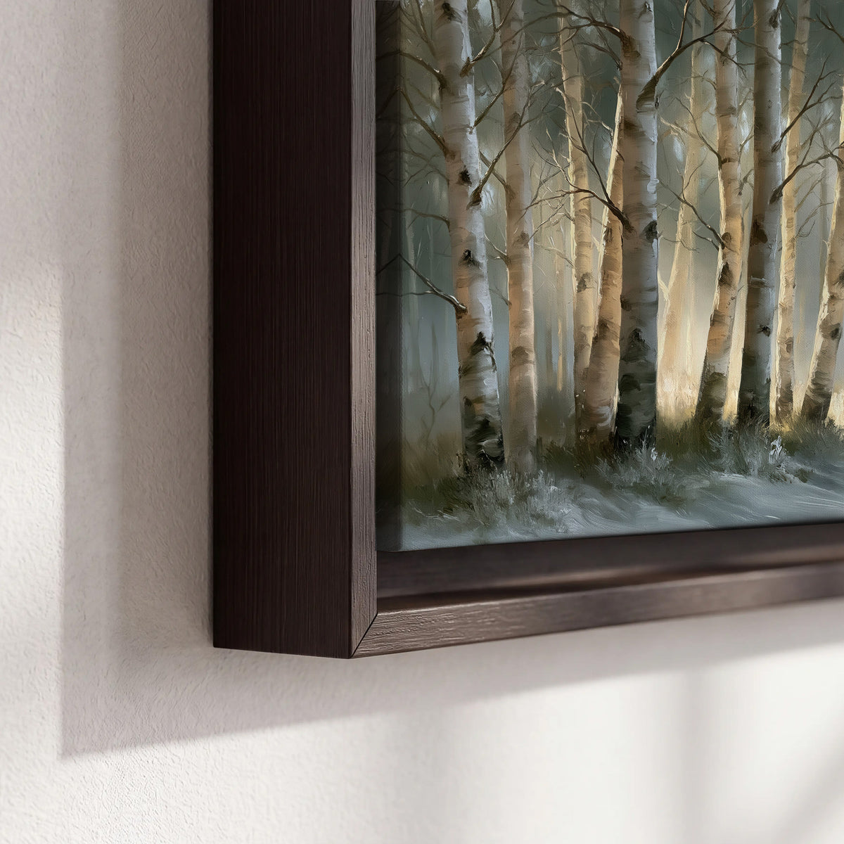 A softly lit woodland path winding between pale birch trunks 3 piece framed canvas wall art material and edge close up
