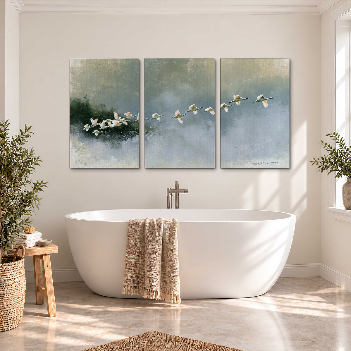 A flock of white birds flying low above a quiet blue-green lake 3 piece canvas wall art styled in an interior
