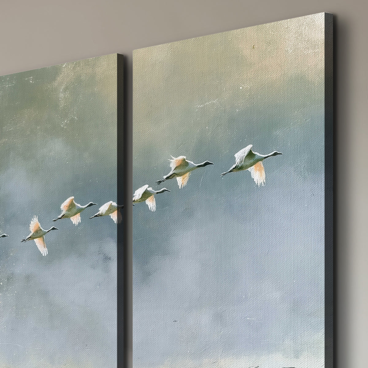 A flock of white birds flying low above a quiet blue-green lake 3 piece canvas wall art room and product view