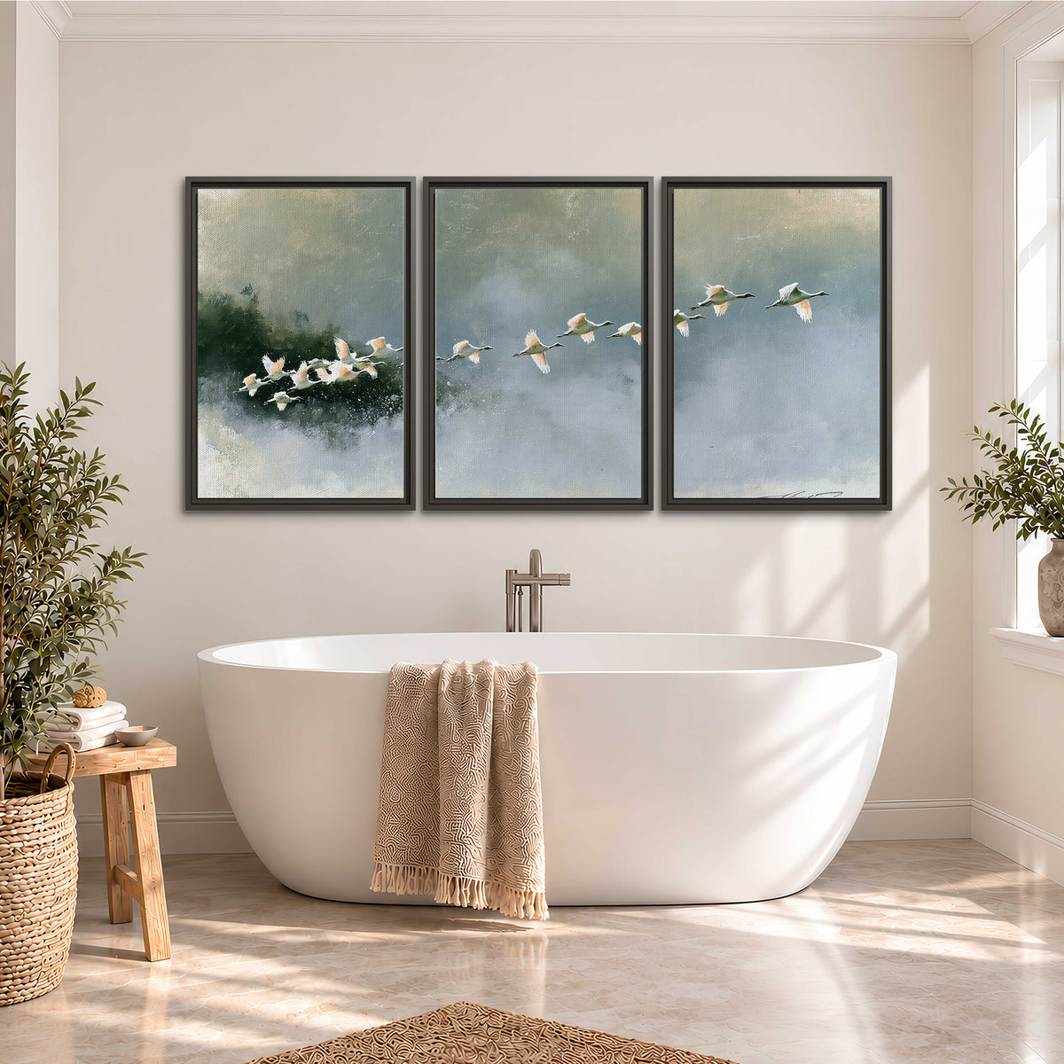A flock of white birds flying low above a quiet blue-green lake 3 piece framed canvas wall art styled in an interior