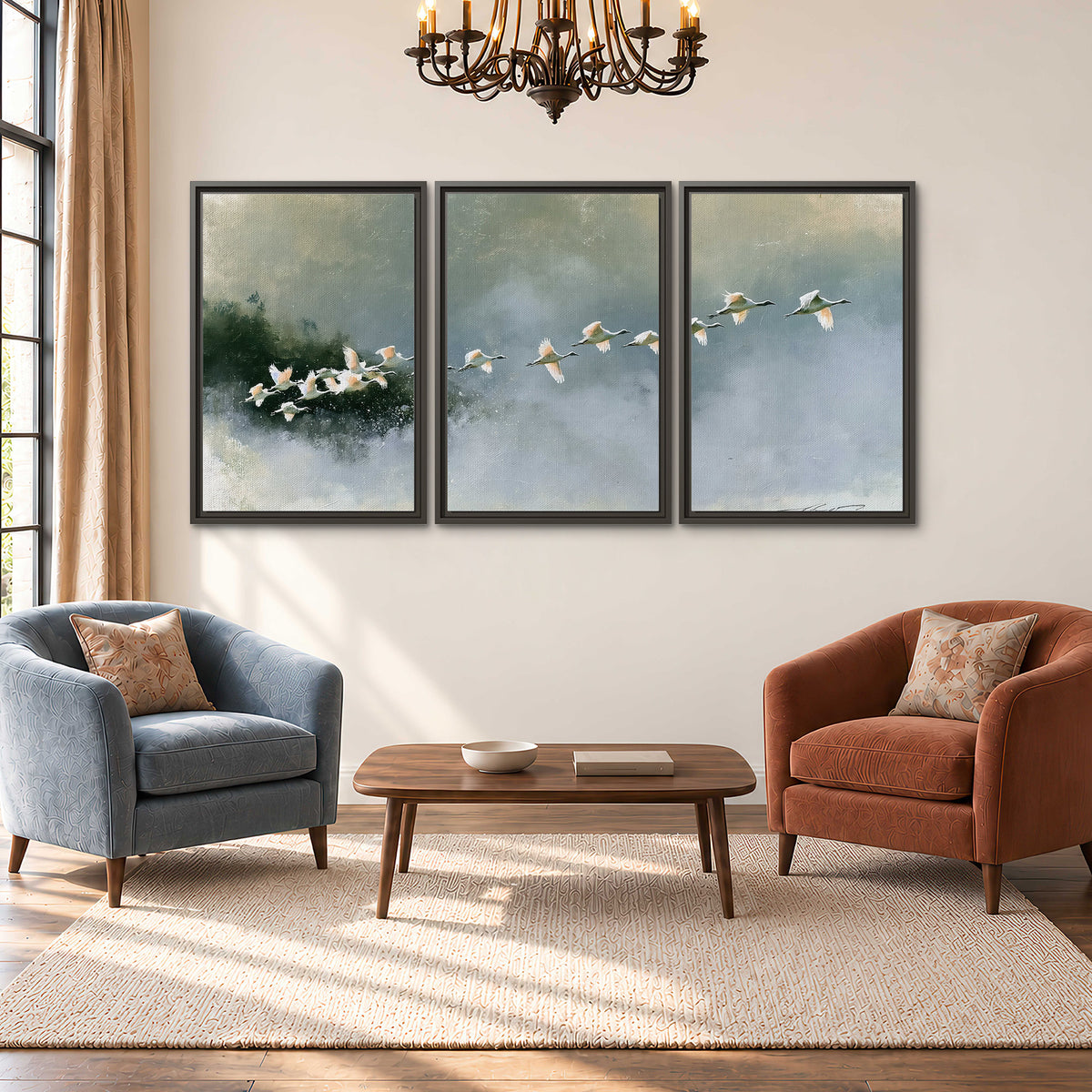 A flock of white birds flying low above a quiet blue-green lake 3 piece framed canvas wall art styled in an interior