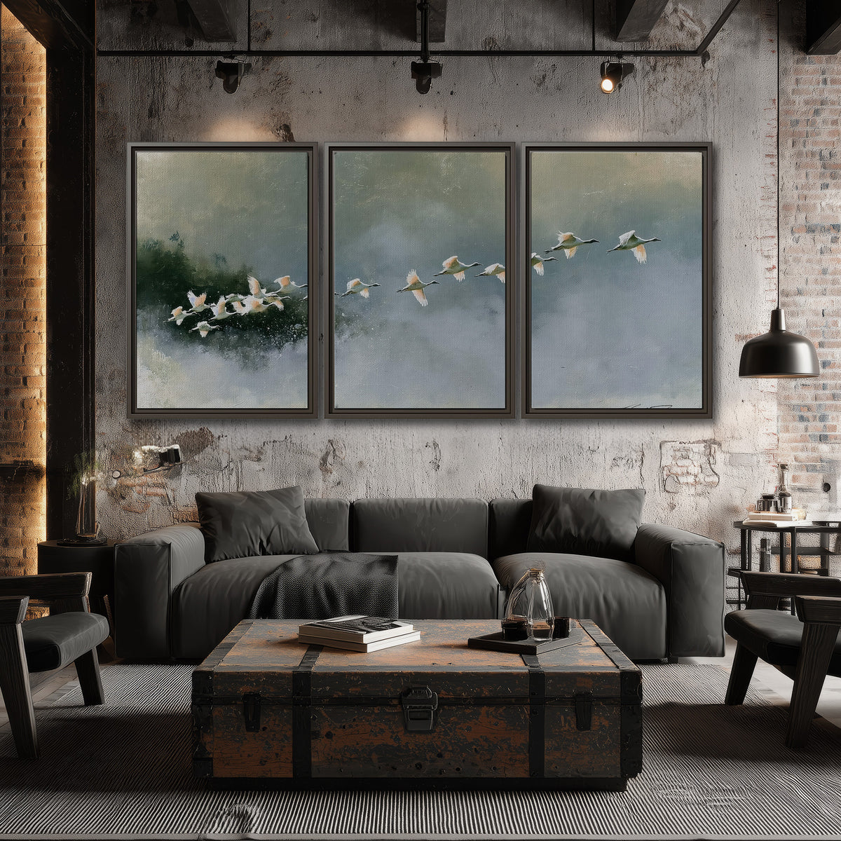 A flock of white birds flying low above a quiet blue-green lake 3 piece framed canvas wall art displayed in a industrial room