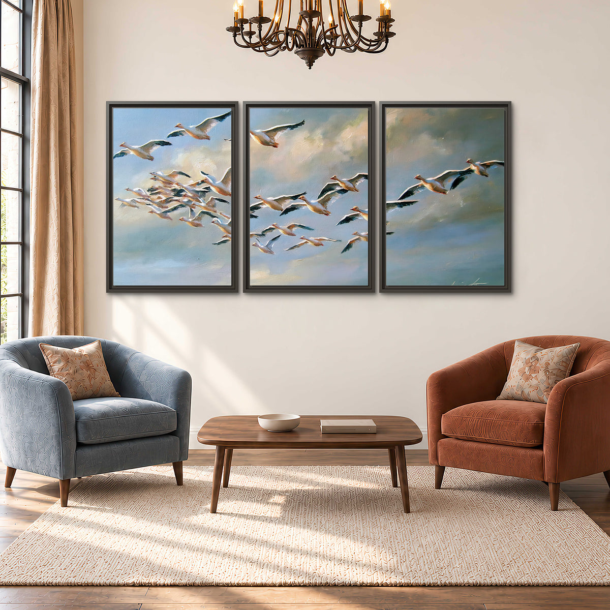 A flock of pale seabirds gliding beneath soft clouds across a blue sky 3 piece framed canvas wall art styled in an interior