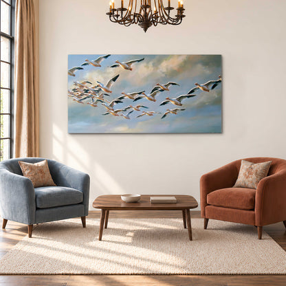 A flock of pale seabirds gliding beneath soft clouds across a blue sky single canvas wall art styled in an interior