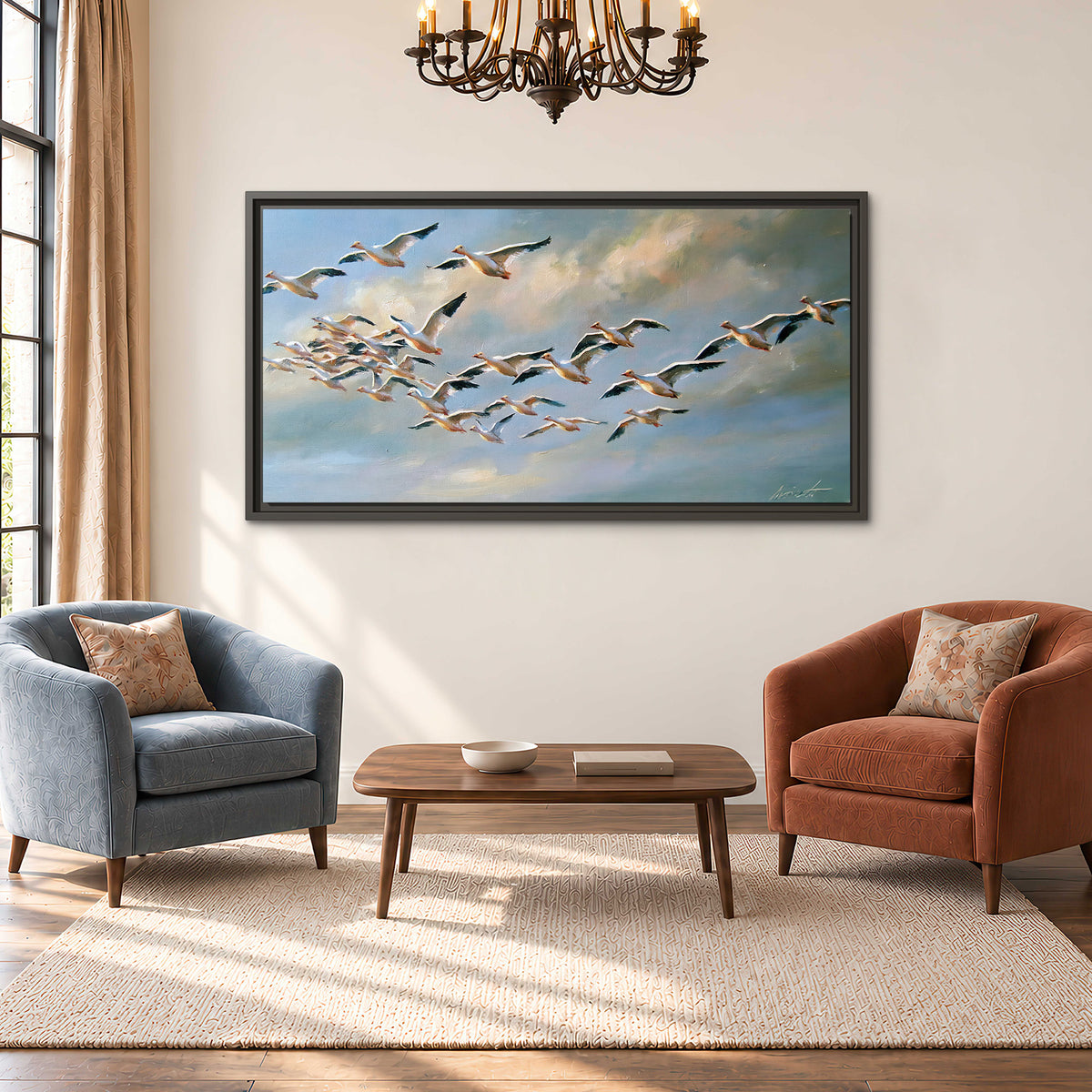 A flock of pale seabirds gliding beneath soft clouds across a blue sky single framed canvas wall art styled in an interior