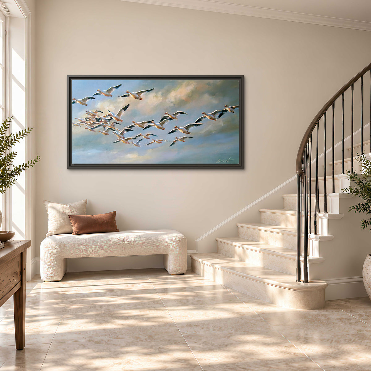 A flock of pale seabirds gliding beneath soft clouds across a blue sky single framed canvas wall art styled in an interior