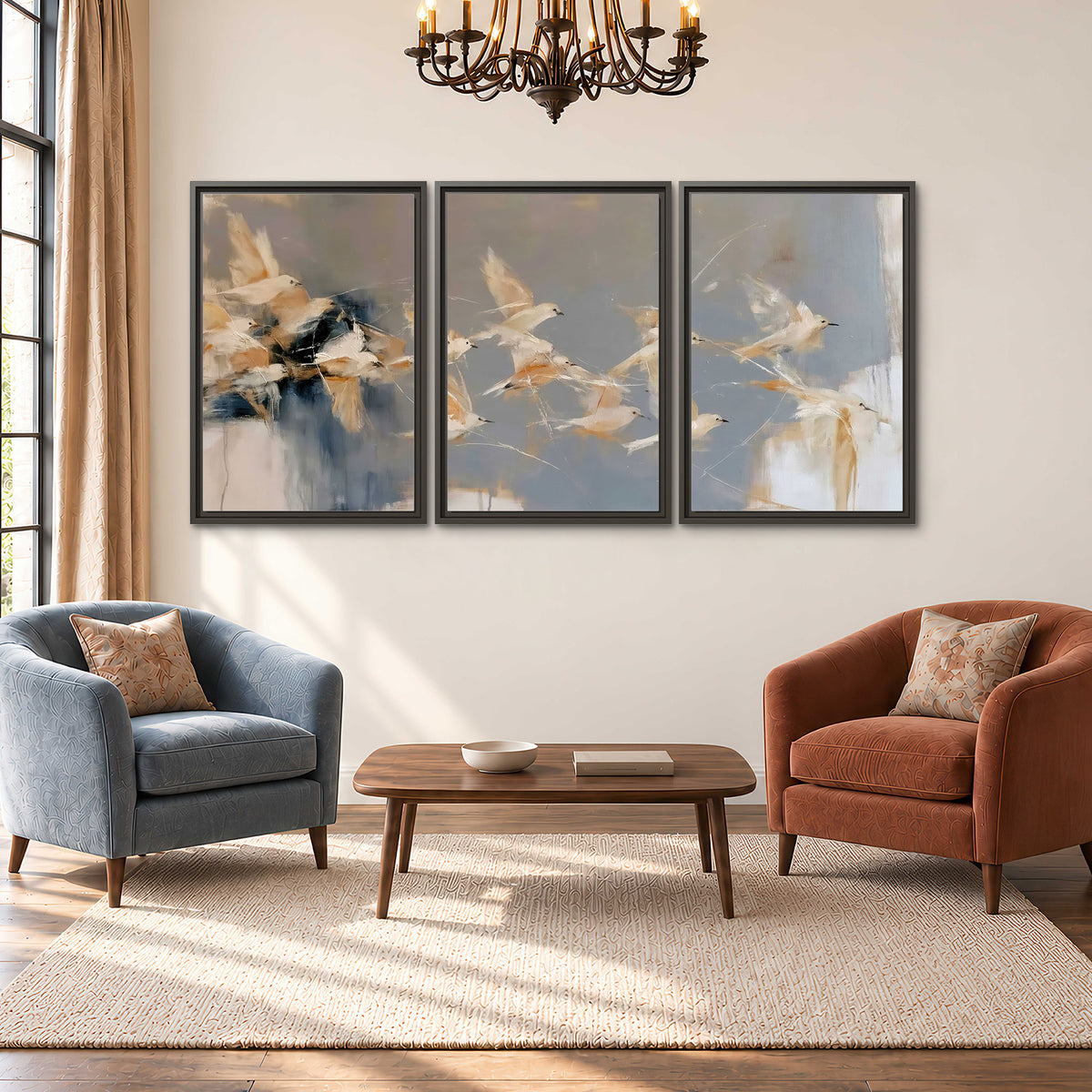 Pale bird-like forms sweeping across layered strokes of blue, ochre and cream 3 piece framed canvas wall art styled in an interior