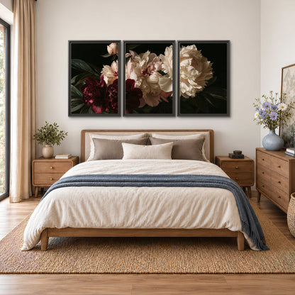 Full ivory and deep burgundy peonies against a dark green background 3 piece framed canvas wall art styled in an interior