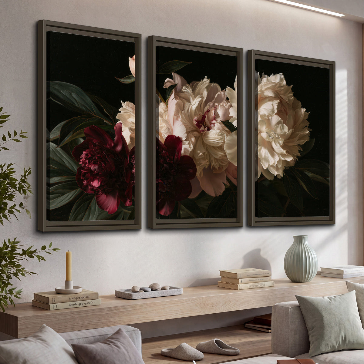 Full ivory and deep burgundy peonies against a dark green background 3 piece framed canvas wall art displayed in a console