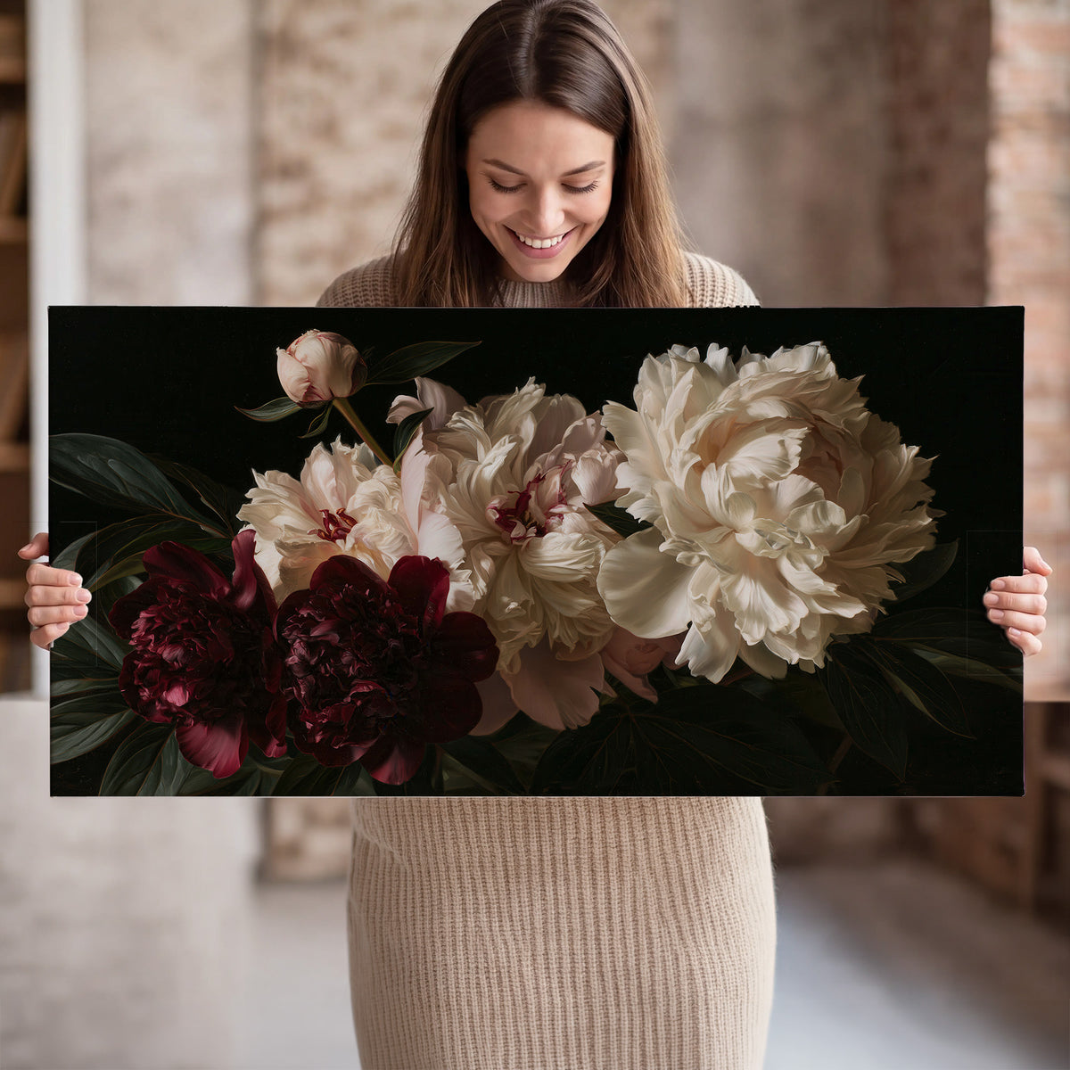 Full ivory and deep burgundy peonies against a dark green background single canvas wall art held in hands