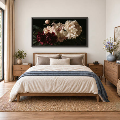 Full ivory and deep burgundy peonies against a dark green background single framed canvas wall art styled in an interior