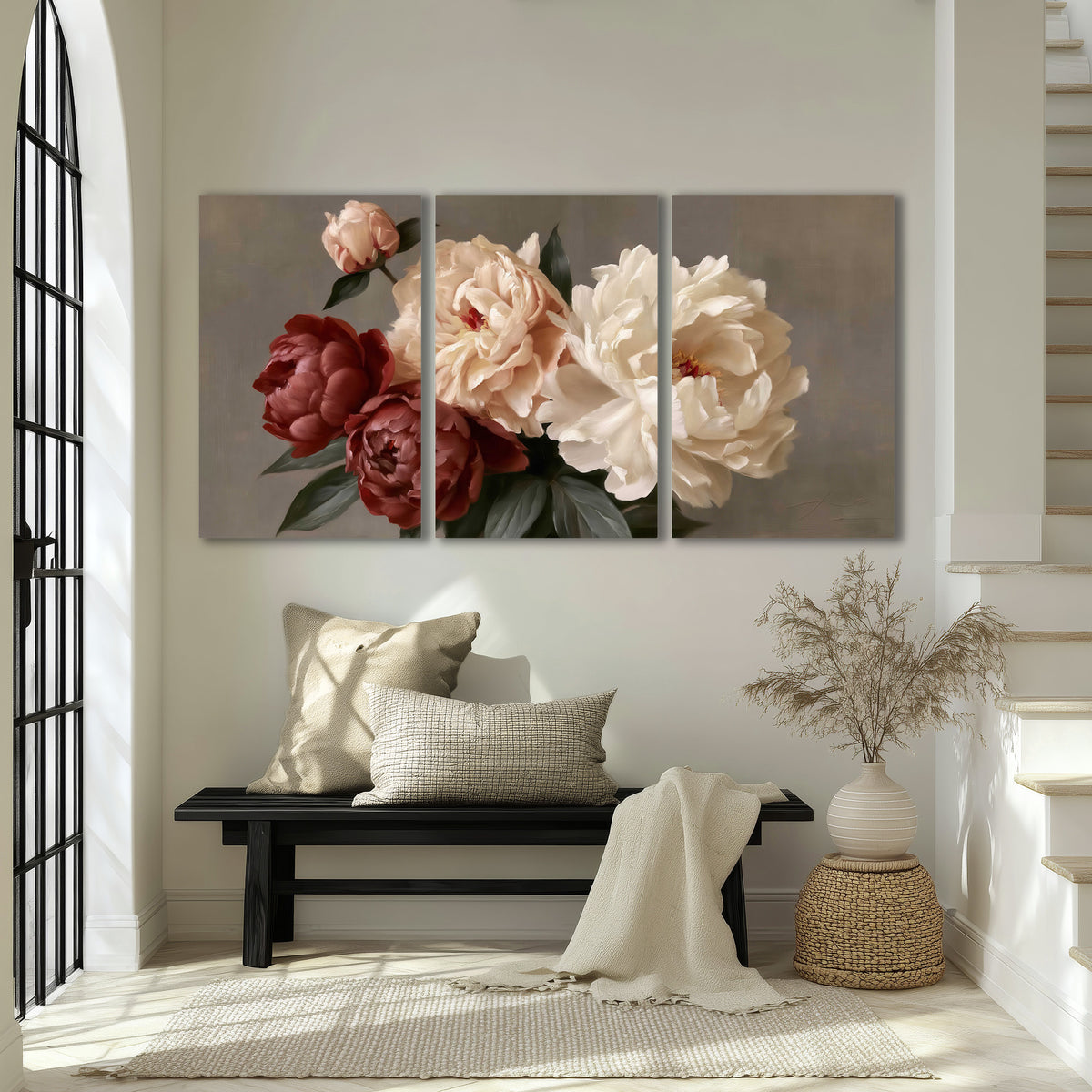 Large blush peonies and rust-colored flowers in a softly shaded arrangement 3 piece canvas wall art displayed in a entryway