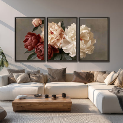 Large blush peonies and rust-colored flowers in a softly shaded arrangement 3 piece framed canvas wall art displayed in a living room