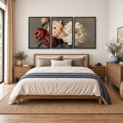 Large blush peonies and rust-colored flowers in a softly shaded arrangement 3 piece framed canvas wall art styled in an interior