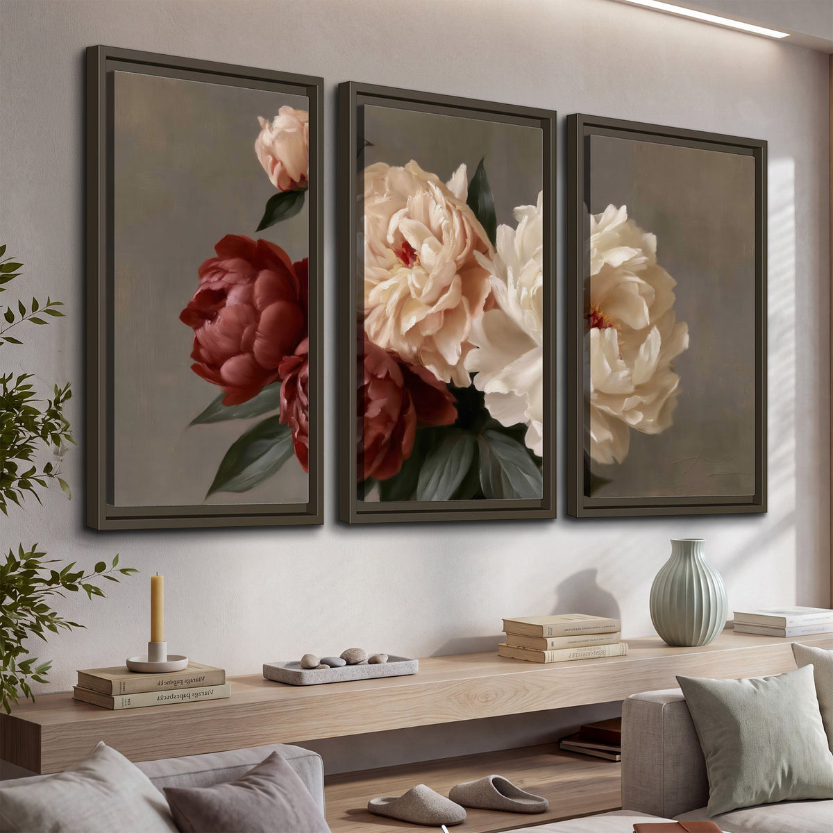 Large blush peonies and rust-colored flowers in a softly shaded arrangement 3 piece framed canvas wall art displayed in a console