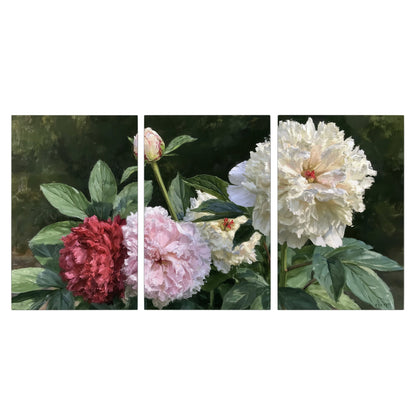 Cream, blush and red peonies surrounded by fresh green leaves 3 piece canvas wall art viewed straight on