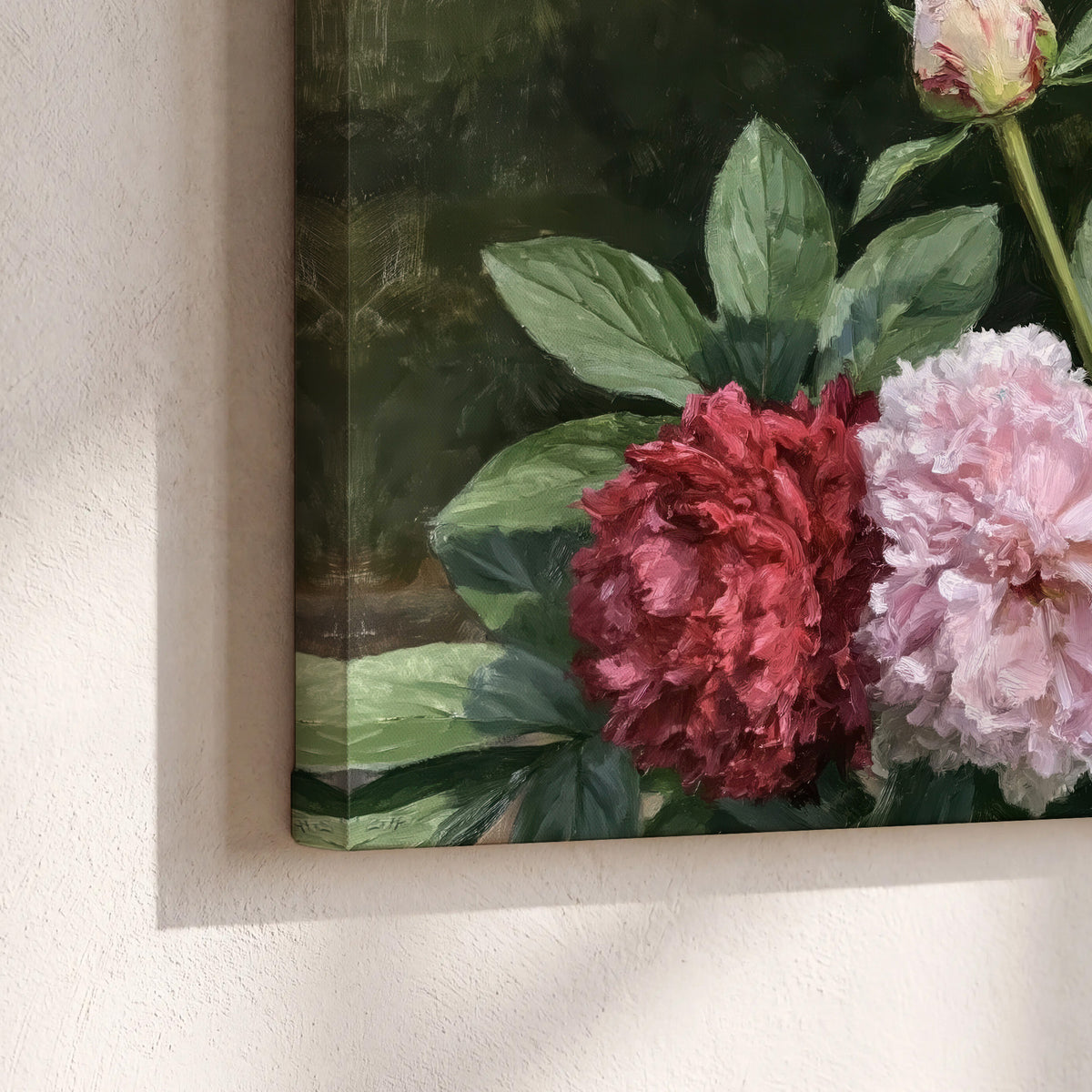 Cream, blush and red peonies surrounded by fresh green leaves 3 piece canvas wall art material and edge close up