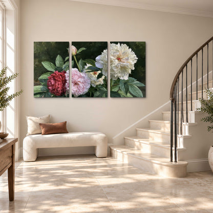 Cream, blush and red peonies surrounded by fresh green leaves 3 piece canvas wall art styled in an interior