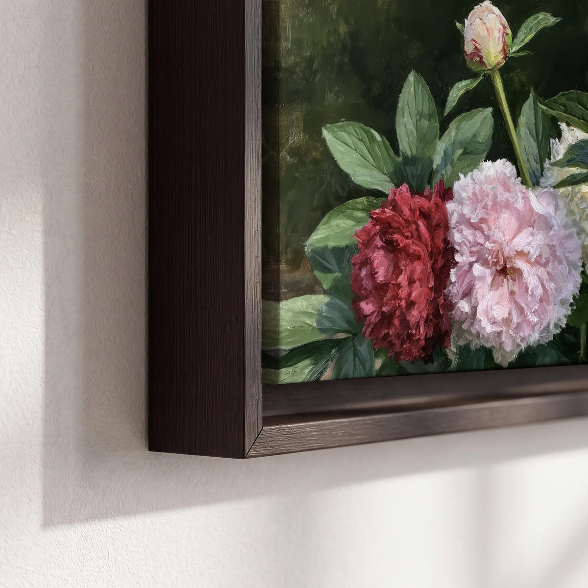 Cream, blush and red peonies surrounded by fresh green leaves 3 piece framed canvas wall art material and edge close up