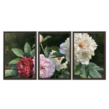 Cream, blush and red peonies surrounded by fresh green leaves 3 piece framed canvas wall art viewed straight on