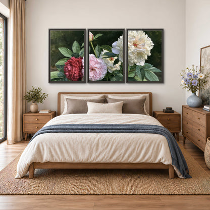 Cream, blush and red peonies surrounded by fresh green leaves 3 piece framed canvas wall art styled in an interior