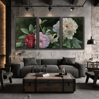 Cream, blush and red peonies surrounded by fresh green leaves 3 piece framed canvas wall art displayed in a industrial room