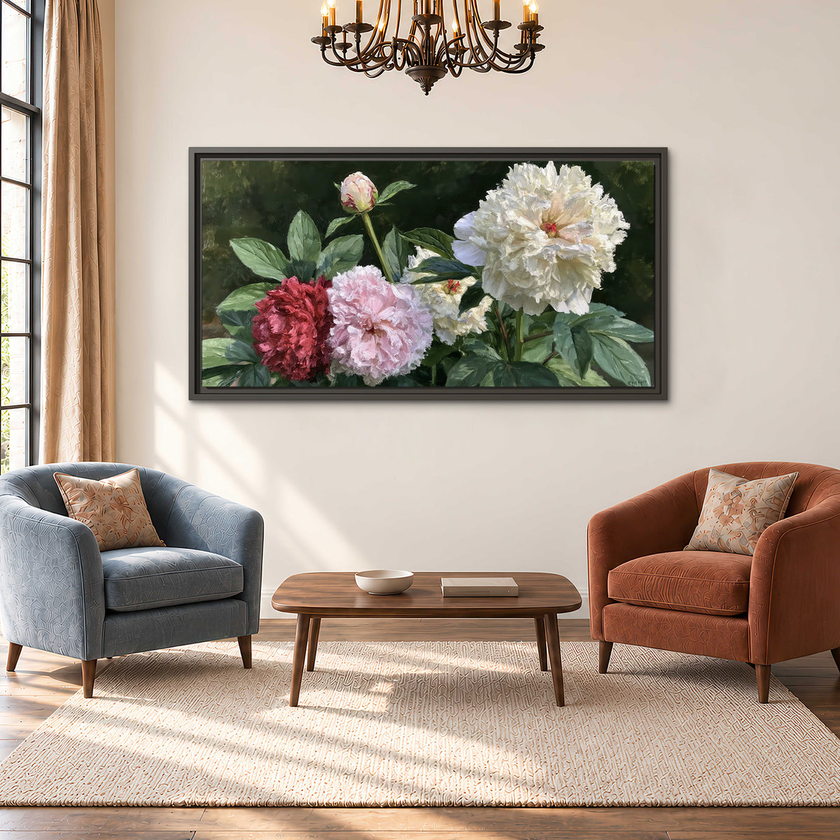 Cream, blush and red peonies surrounded by fresh green leaves single framed canvas wall art styled in an interior