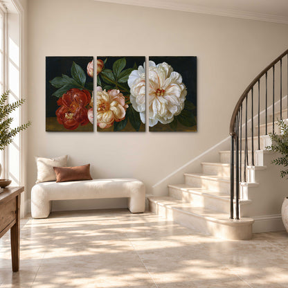 A large pale peony beside small ruby-red and peach flowers on a deep green ground 3 piece canvas wall art styled in an interior