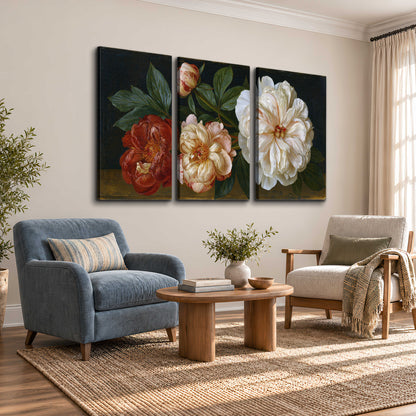 A large pale peony beside small ruby-red and peach flowers on a deep green ground 3 piece canvas wall art styled in an interior
