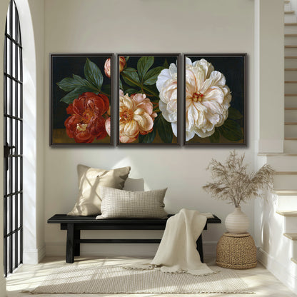 A large pale peony beside small ruby-red and peach flowers on a deep green ground 3 piece framed canvas wall art displayed in a entryway