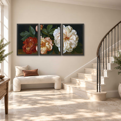A large pale peony beside small ruby-red and peach flowers on a deep green ground 3 piece framed canvas wall art styled in an interior
